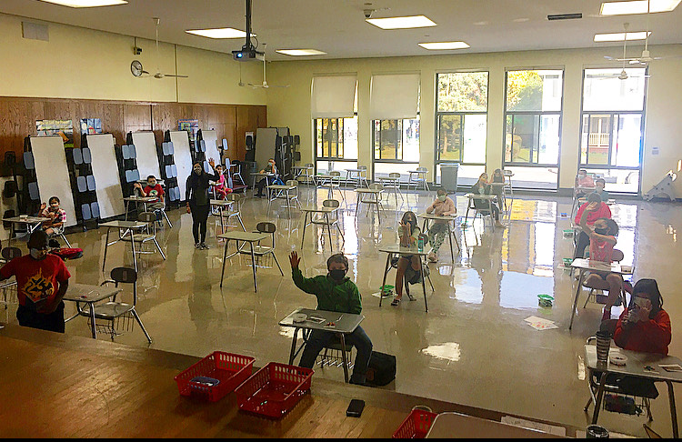 students seated in cafeteria