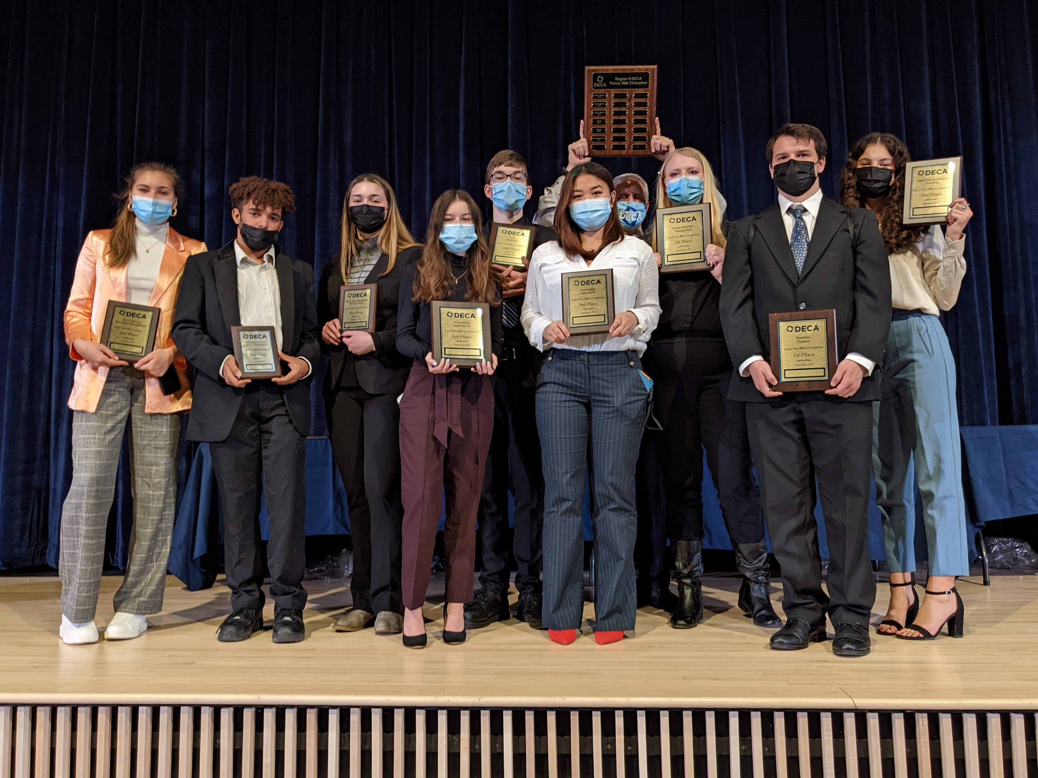 award winner students on stage