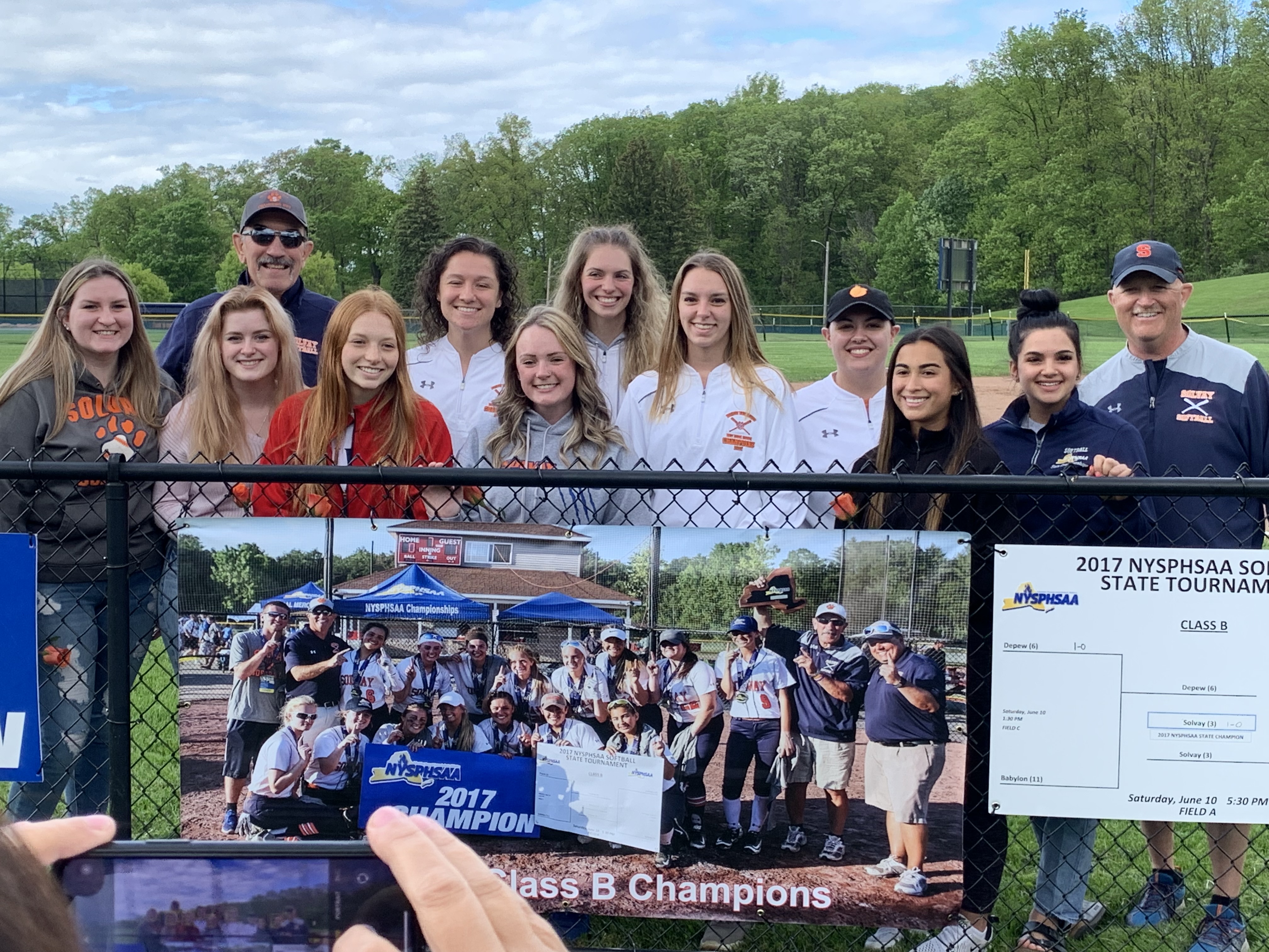 2017 NYSPHSAA Team Reunion, posed near signs
