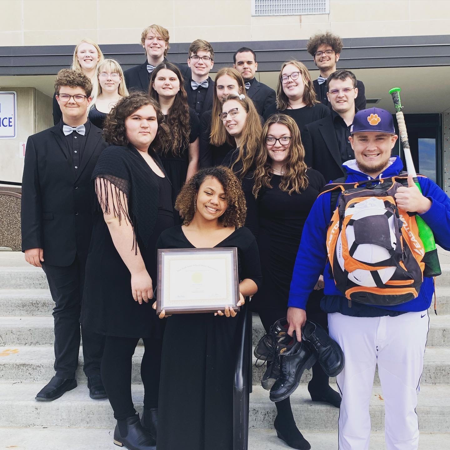 music students pose for photo after winning GOLD