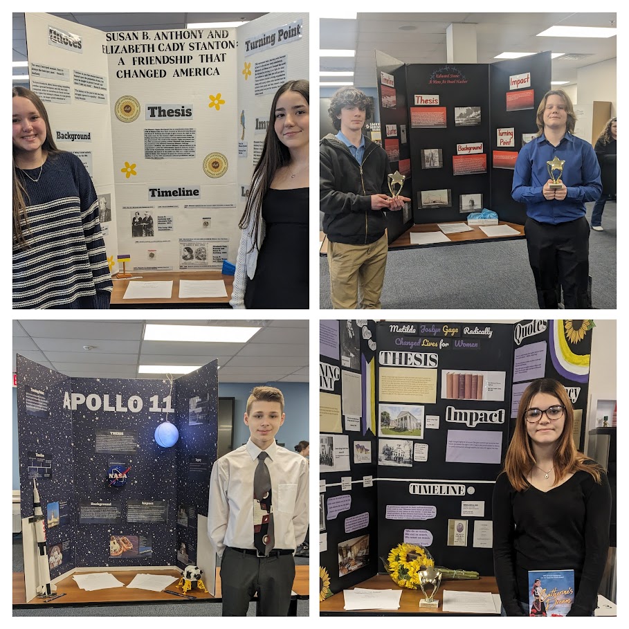 students pose with their History day entries