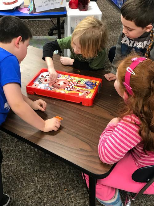 Kids playing boardgames