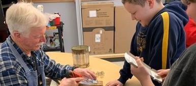 SMS Students Experience Tinsmithing